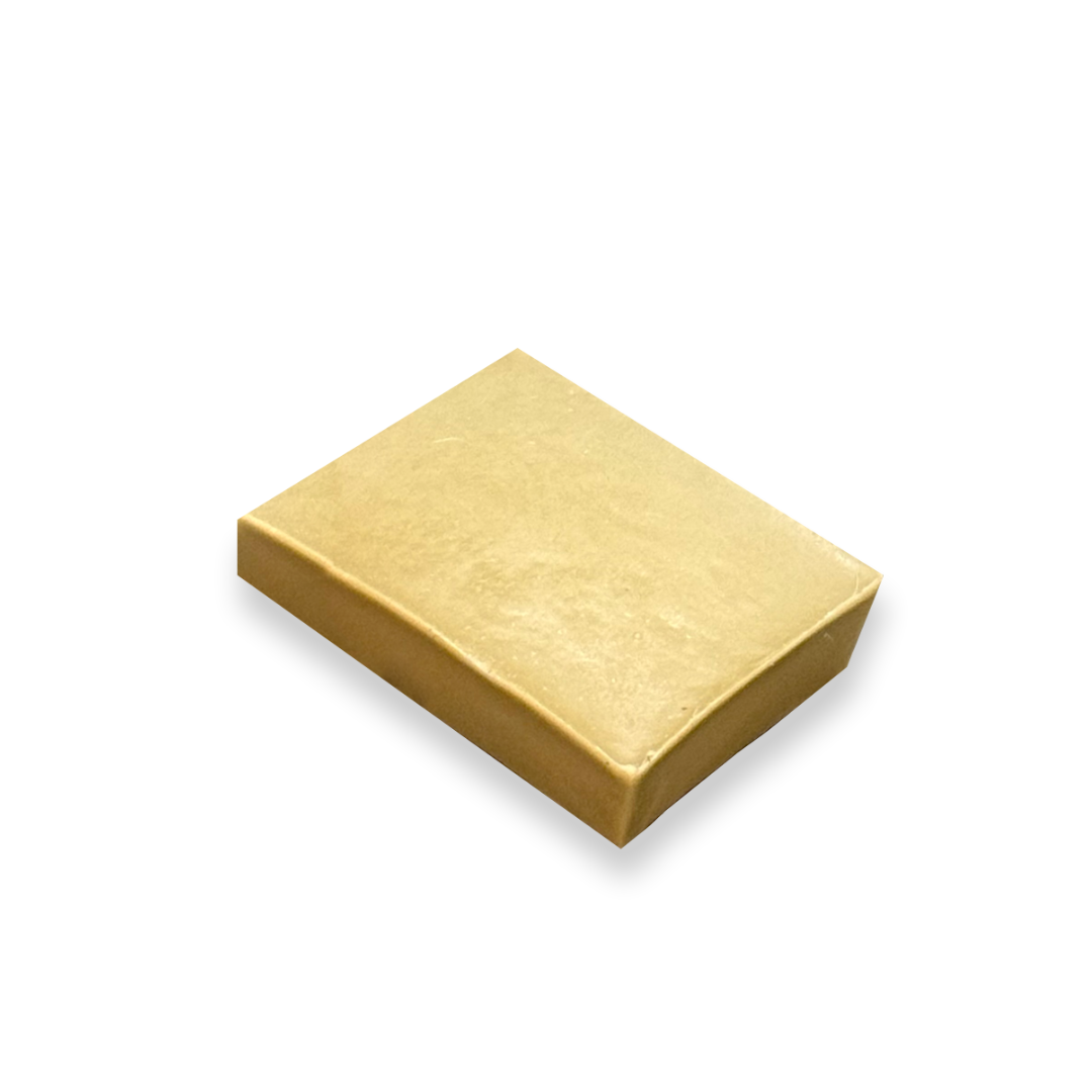 Square , tan organic hair and beard moisturizing conditioner bar.