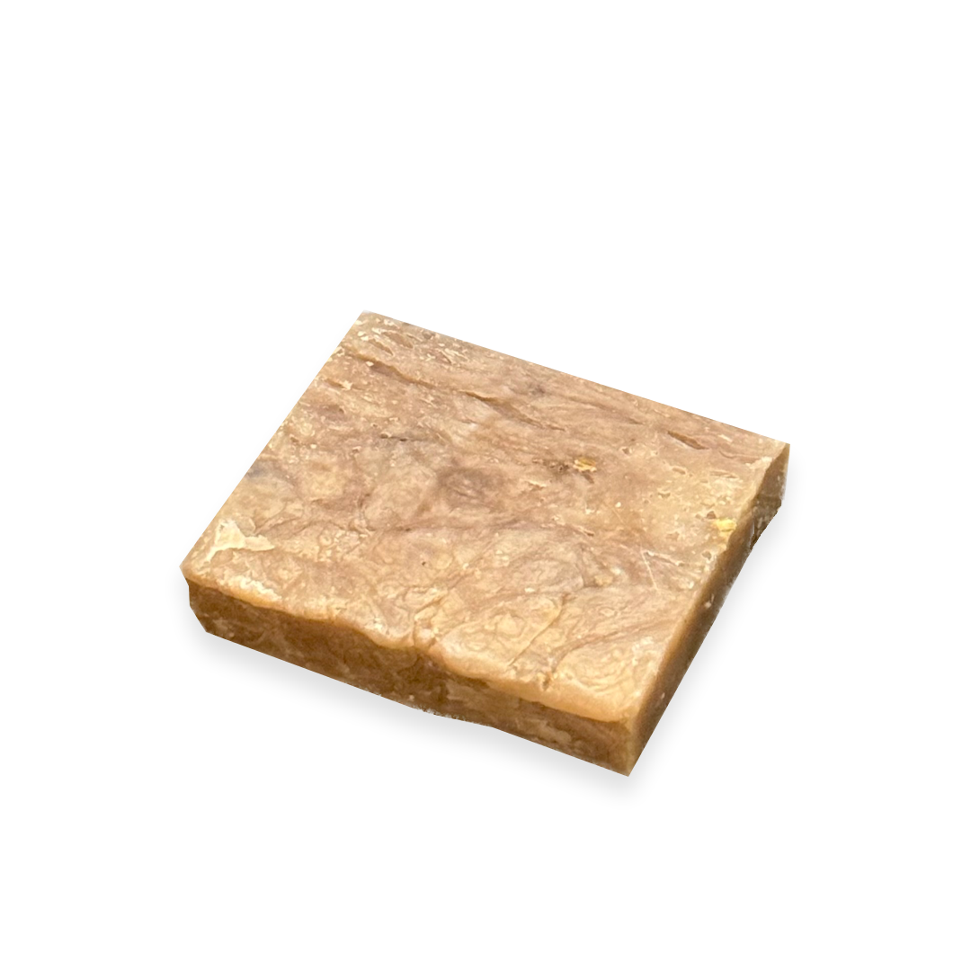 Rectangular bar of Organic handmade honey oatmeal soap.