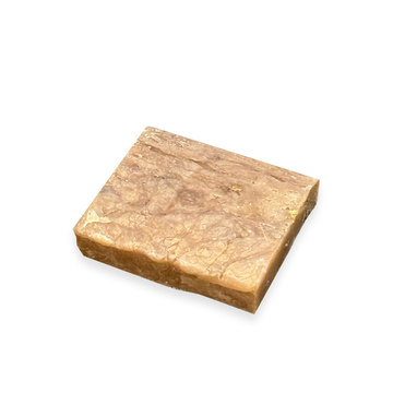 Rectangular bar of Organic handmade honey oatmeal soap.