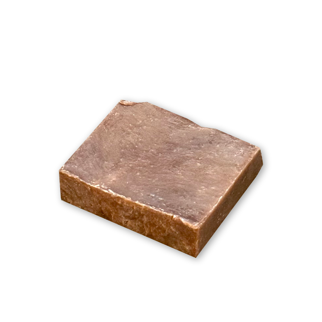 Chocolate colored rectangular sandalwood and vanilla soap bar.
