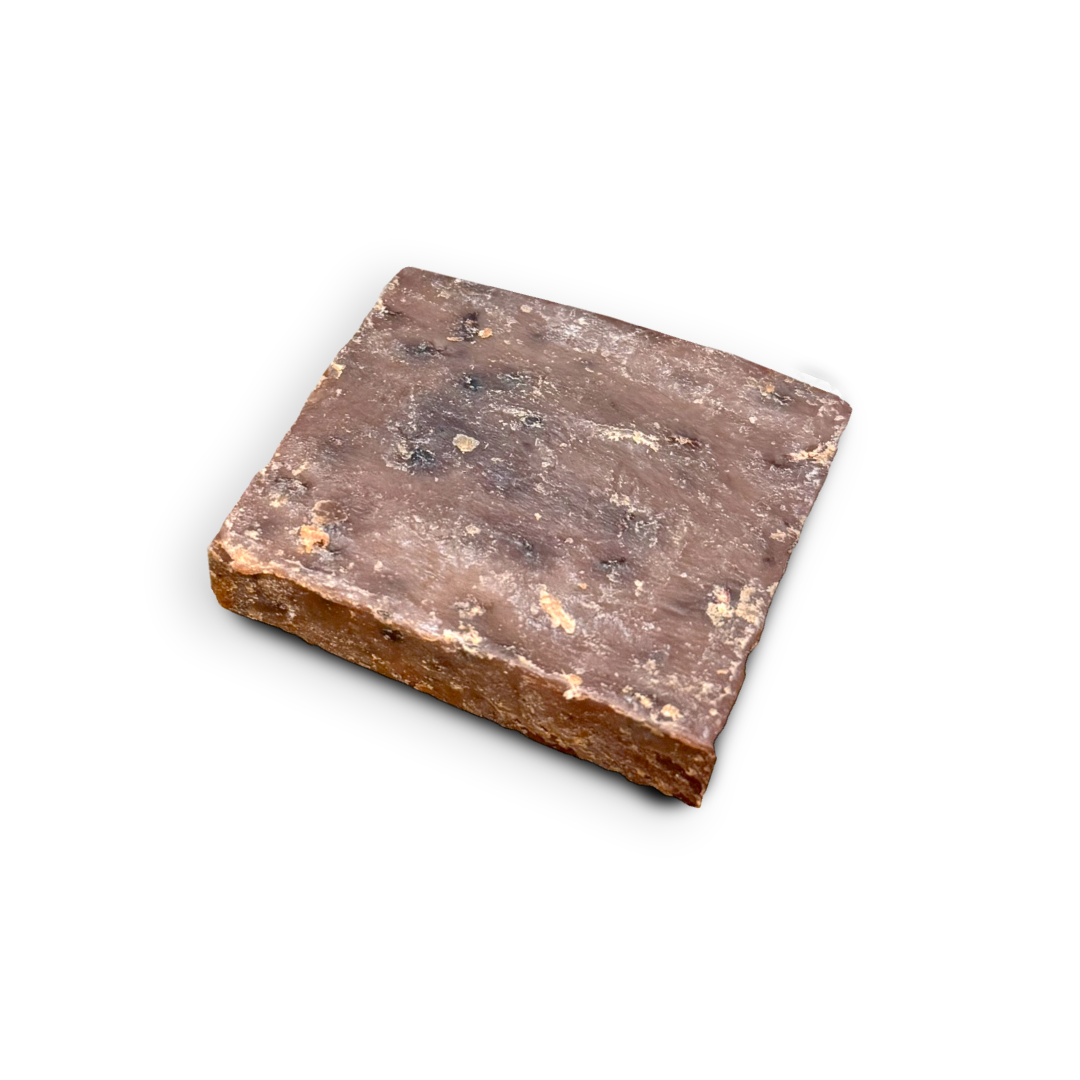 A square, rough-cut stone tile with a textured surface, showing earthy brown and gray tones, isolated on a white background.