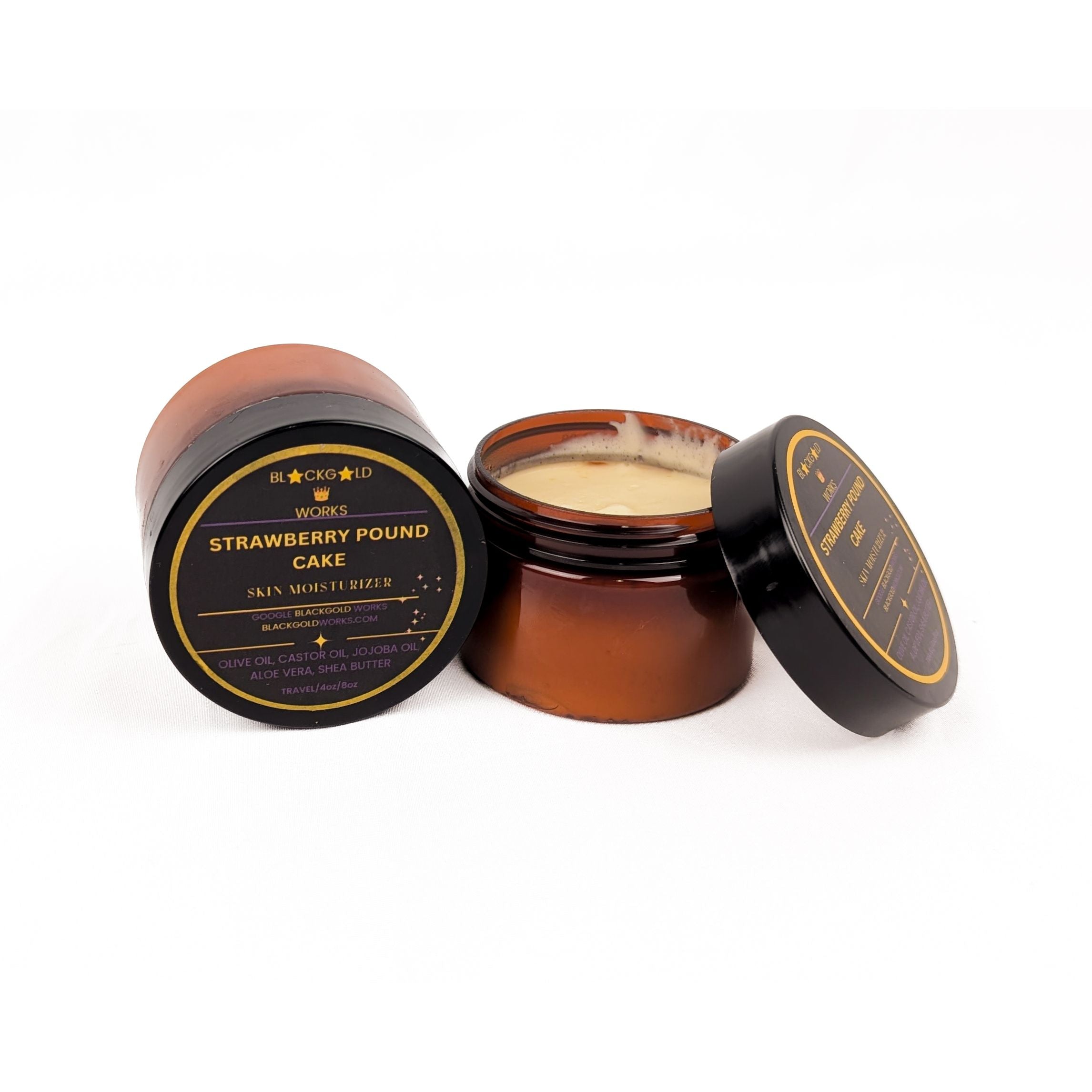 Open amber-colored jar of Strawberry Pound Cake organic eczema cream with black and gold lid. - BlackGold Works - Cracked feet, Cracked skin, Dry skin relief, Eczema, Eczema cream, Eczema creme, Natural collagen, Natural moisturizer, Natural products, Sensitive skin soap, Skin moisturizer, Turmeric soap - Eczema Essentials Kit